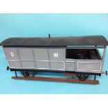 A 5 inch gauge model of a Great Western 20 ton Brake van, with grey livery