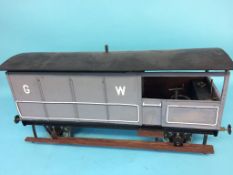 A 5 inch gauge model of a Great Western 20 ton Brake van, with grey livery