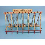 A wooden painted Fairground Swing, 'Les Burford High Flyers'. 50cm wide x 30cm long