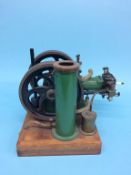 A model single cylinder petrol, horizontal beam engine. 23cm width x 35cm height