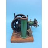 A model single cylinder petrol, horizontal beam engine. 23cm width x 35cm height