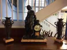 A Continental spelter clock and garniture
