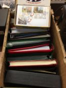 A box of 14 assorted stamp collections