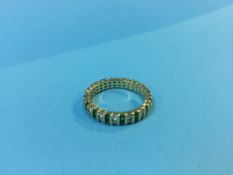 A gold coloured emerald ring, 5g