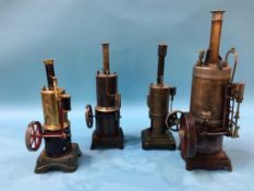 Four tin plate model vertical engines
