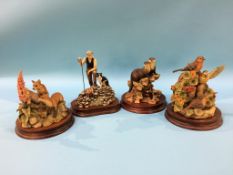 Four boxed Border Fine Arts figures