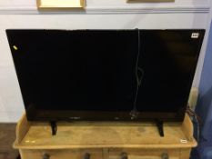 A 42" Digihome TV (with remote)