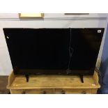 A 42" Digihome TV (with remote)