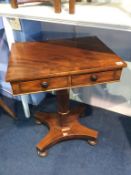 A Victorian mahogany two drawer side table