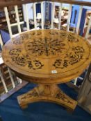 A Continental walnut centre table