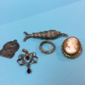 A cameo brooch and articulated fish etc.