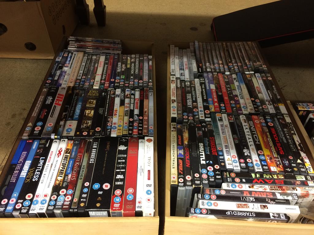 Four boxes of assorted DVDs, to include the Hobbit, Saw etc. - Image 2 of 3