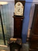 An oak cased eight day long case clock