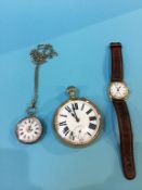 A large pocket watch, one other and a gents wristwatch