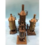 Four tin plate model vertical engines