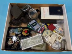 A tray of assorted badges, pins and whistles etc.