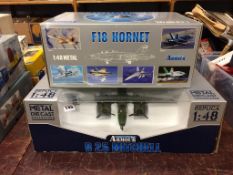 Two boxed model planes, F18 Hornet and B25 Mitchell