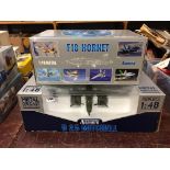 Two boxed model planes, F18 Hornet and B25 Mitchell