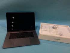 An Apple Mac book (sold as seen, spares and repairs)