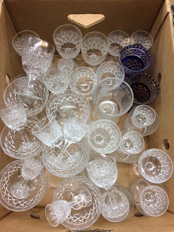 A box of assorted cut glass