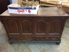 A Georgian oak mule chest with two drawers.