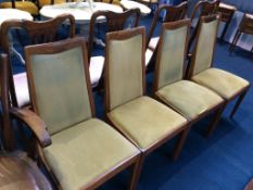 A set of four teak G Plan dining chairs