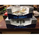 Two boxed model planes, F18 Hornet and B25 Mitchell