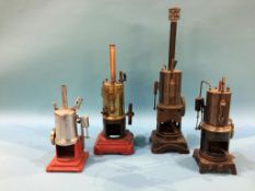 Four tin plate vertical engines