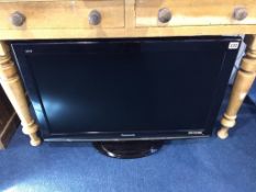 A 32" Panasonic TV (with remote)