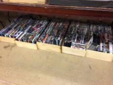 Five boxes of assorted DVDs, to include 007 and Deadpool etc.