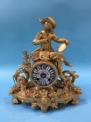A gilt metal mantle clock