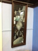 An engraved glass mirror