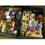 Two boxes of assorted model cars, to include Corgi and Vanguard etc.