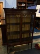 An Edwardian mahogany glazed china cabinet