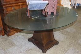 A frosted glass oval kitchen table