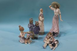 Four Lladro figures and two Nao figures (6)