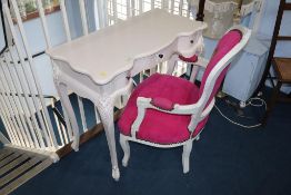 A white painted side table and white French style chair