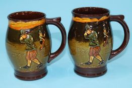 A small pair of Royal Doulton 'Golfing' jugs