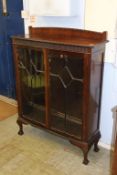 A mahogany china cabinet