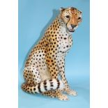 A large Italian seated Cheetah. 46cm high and two Cheetahs playing