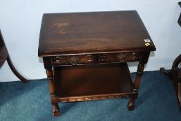 An oak two drawer side table