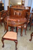 A mahogany sideboard, extending table and six chairs