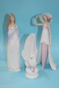 A Lladro figure of a Dove, a Lladro figure of a girl holding her hat and a Nao figure (3)