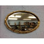 A gilt framed mirror