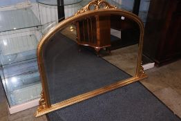 A modern gilt overmantel mirror