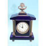 A small blue glass and brass mounted clock. 19cm high