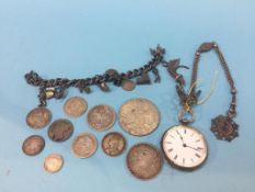 A Continental silver pocket watch, charm bracelet and various coins