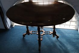 A Victorian walnut oval table