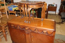 An oak sideboard, walnut half moon table, a Grandmother clock and a treddle sewing machine