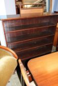 A mahogany open bookcase